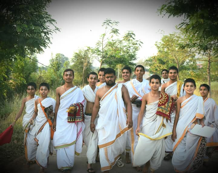 Gurukul-trained Vedic pandits walking together after traditional study