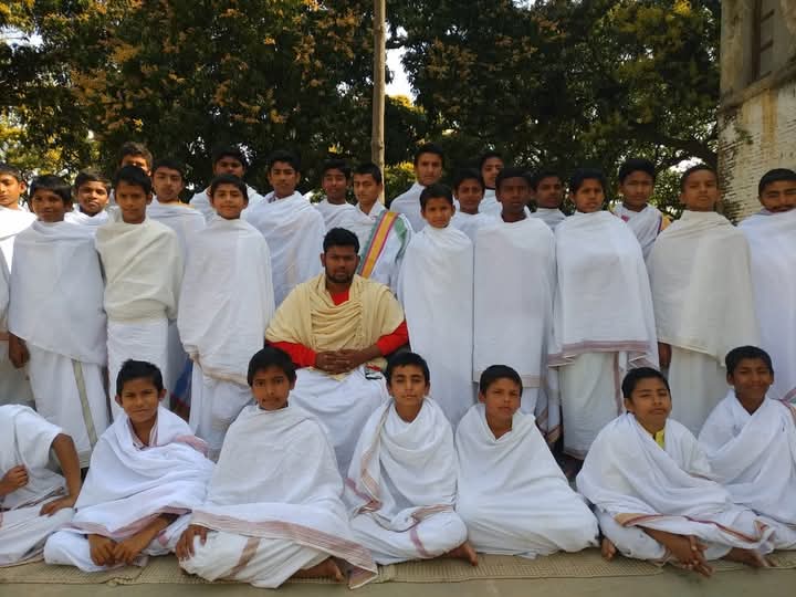 Students and acharya of a traditional Vedic Gurukul